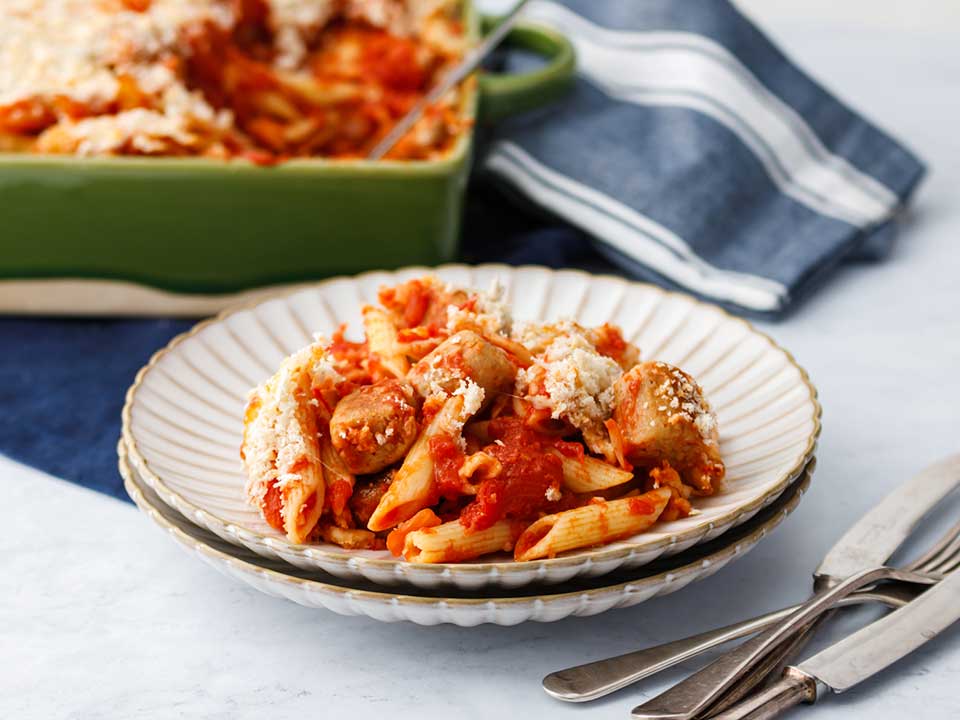 Meat free sausage pasta bake served in a shallow bowl