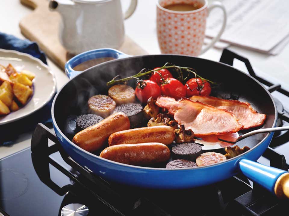 Frying pan with Denny Sausages, Rashers, Pudding and tomatoes